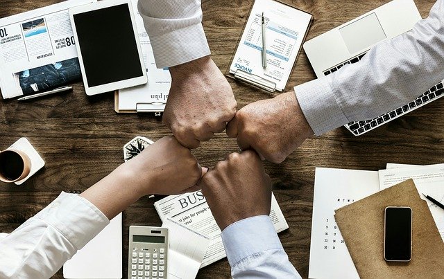 Hands in a circle giving a "fist bump" to celebrate hard work well done. You are not alone with your social anxiety in Tigard, OR. You can get help for anxiety, grief and loss, and life transitions during COVID 19 with online therapy in Oregon here!
