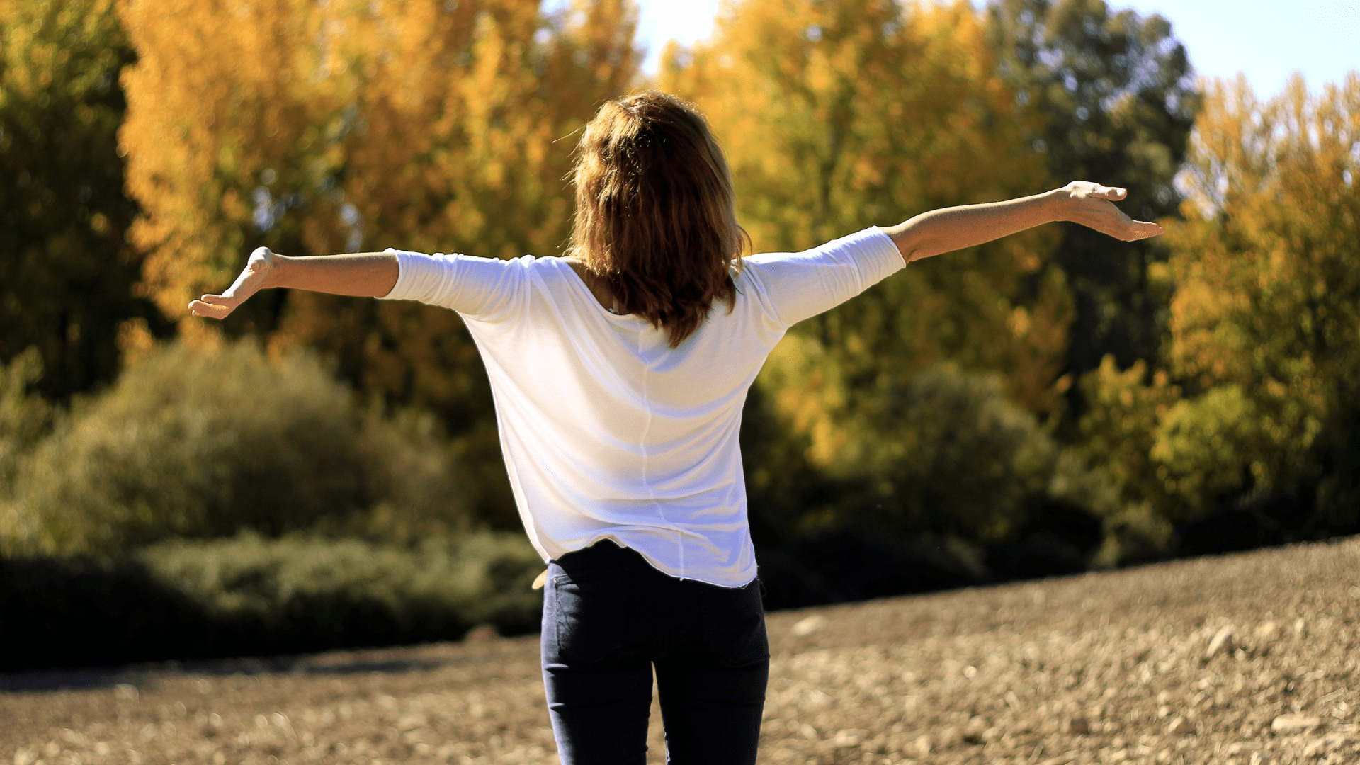 Arms open | Therapy for anxiety Tigard, OR | depression treatment | relationship therapy | family counseling | 97224 Woman turned away with arms wide open. Showing how a therapist in Tigard, OR can help with the struggles of health anxiety, codependency counseling, and stress counseling. Contact us to talk about online therapy for codependency in Oregon.