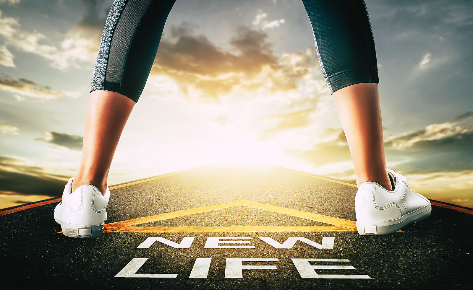 New life | Therapy for life transitions Tigard, OR | online therapist Oregon | codependency therapy | social anxiety | 97223 Image of a person standing on a road with "New Life" written on it. Changing your mindset during life transitions can be easier with the help of a online therapist in Oregon. Whatever you're going through our online therapists can help you with therapy for life transitions in Tigard, OR 97223.