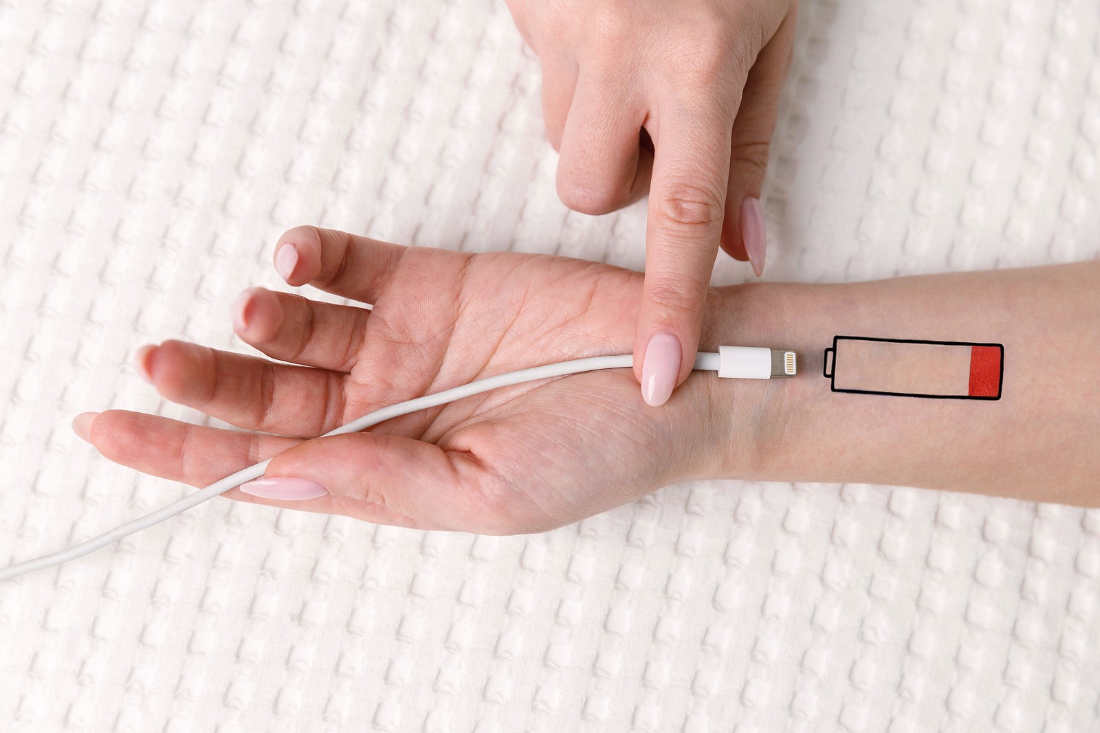 A close up of a person with a low battery symbol on their wrist. Learn how a Christian therapist in Tigard, OR can help fix your relationship with social media. Learn more about counseling for depression in Tigard, OR and other forms of support today.
