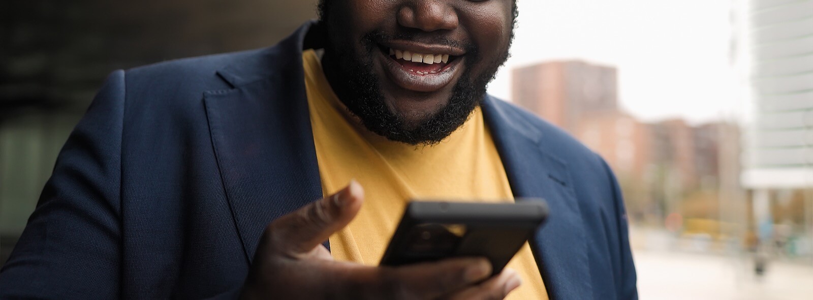 A person smiles while looking at their phone. This could symbolize a better experience with social media after meeting with a Christian therapist in Tigard, OR. Learn more about anxiety treatment in Tigard, OR and the support it can offer today.
