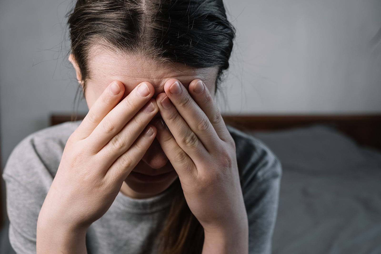 covering face | christian therapist in tigard, or | therapy for depression tigard, or | christian counseling in tigard, or | 97221 | 97222 | 97223 A woman covers her face while sitting on a couch. This could represent the isolation of depression that Christian counseling in Tigard, OR can address. Learn more by searching therapy for depression Tigard, OR today.