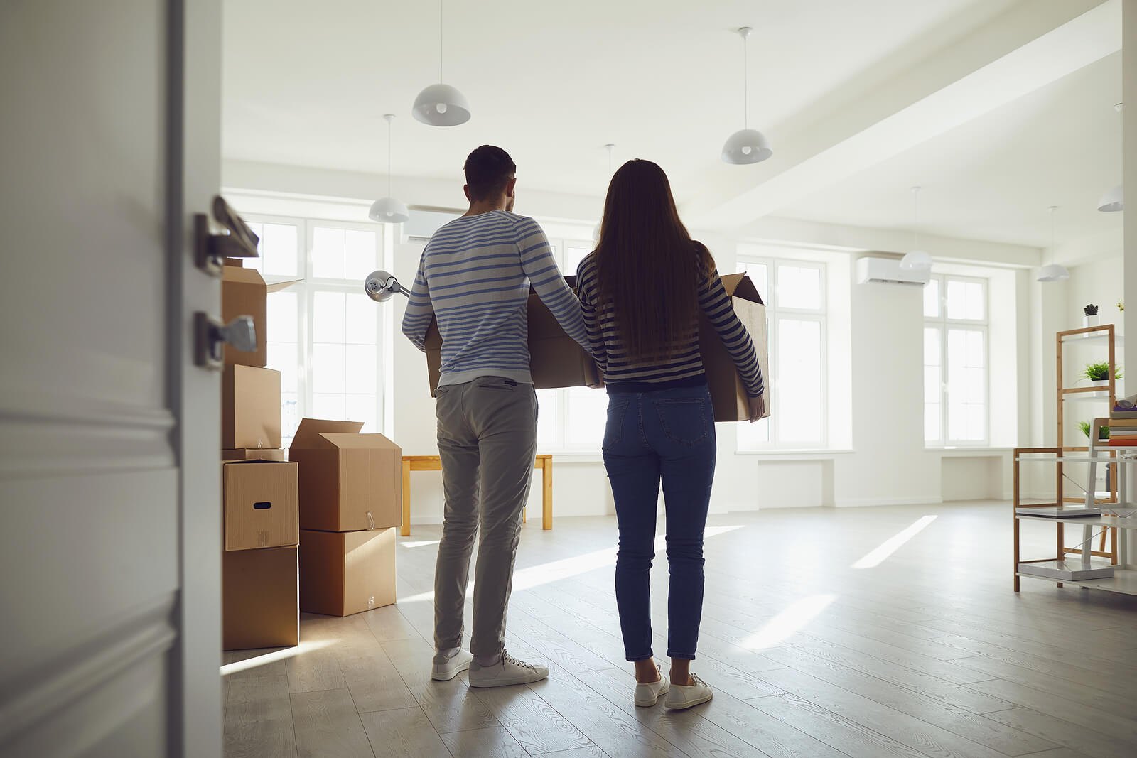 moving boxes | major life changes in tigard, or | online therapist in oregon | online therapy in oregon | 97223 A couple hold boxes while entering an empty room. Learn how major life changes in Tigard, OR can cause stress and how an onlline therapist in Oregon can offer support. Learn more about therapy in Tigard, OR, life transition counseling, and other services.