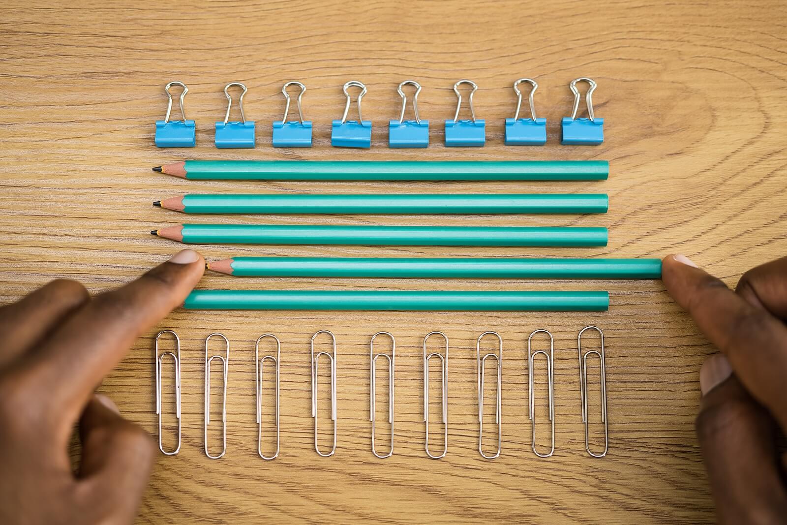 A person moves a pencil in line with other office supplies. Learn more about the help a Christian therapist in Tigard, OR can offer with perfectionism. Search for therapy in Tigard, OR for more support or search “oregon online therapist” today.
