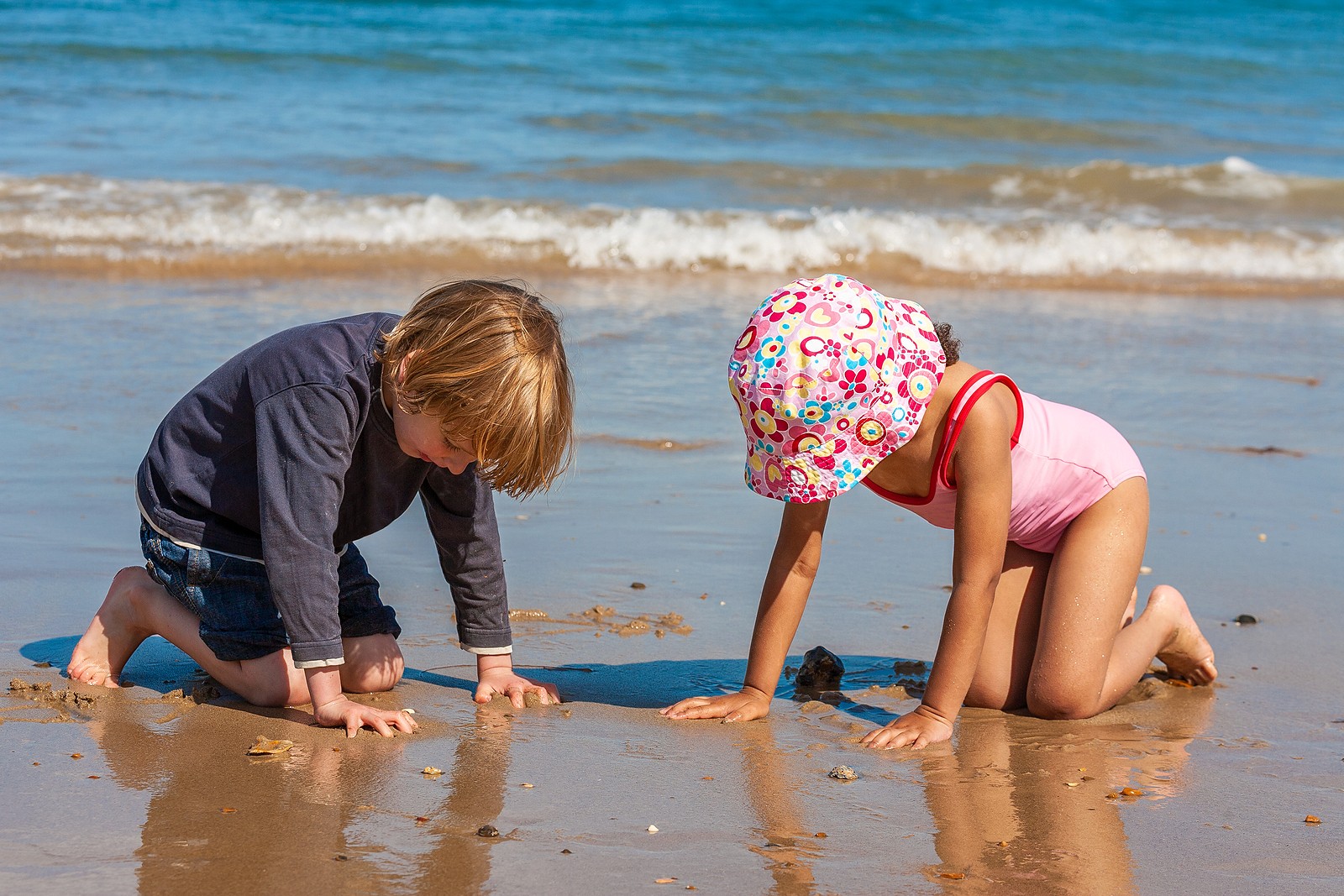kids playing on shore | christian therapist in tigard, or | child therapist near me | christian counseling in tigard, or | 97223 | 97224 | 97281 Two young kids play in the sand on the shore of a beach. This could represent the benefits of play that a child therapist in Tigard, OR can help you and your child harness. Search “child therapist near me” or contact an online therapist in Oregon today.
