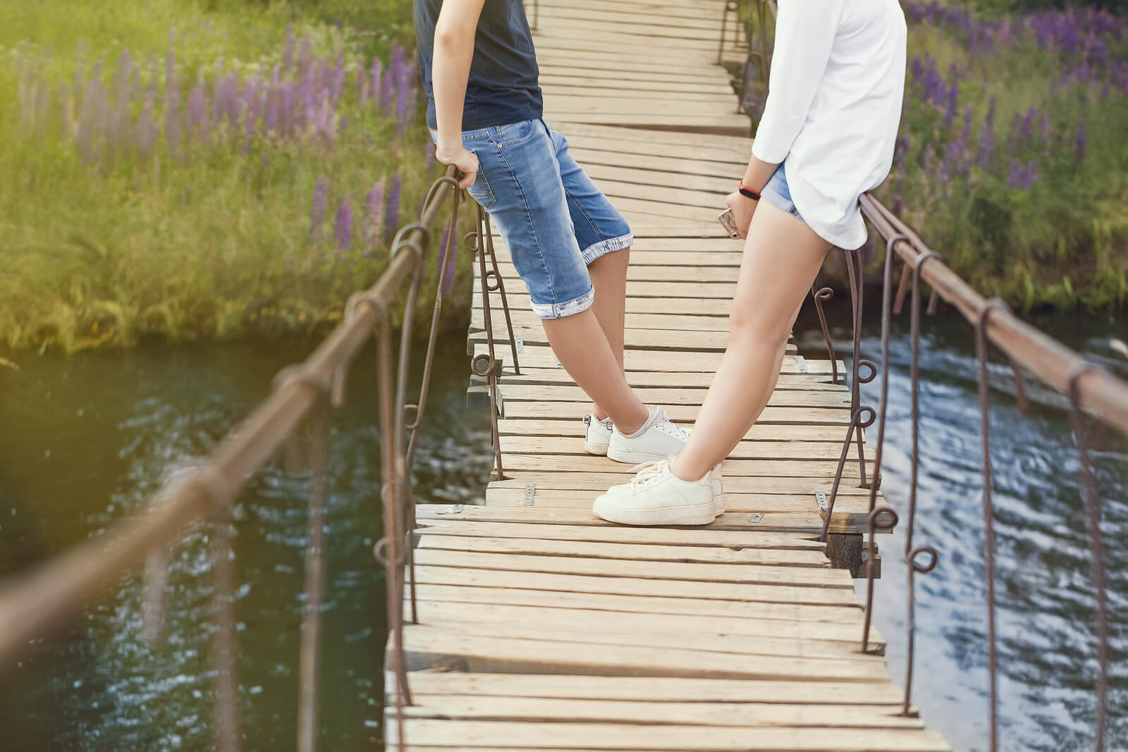 talking on bridge | christian therapist in tigard, or | christian counseling in tigard, or | christian counseling near me, tigard, or | 97223 | 97224 | 97281 Two people stand on a bridge over a lake while talking with one another. This could represent the support that friends can offer with mental health concerns. Learn how an online therapist in Oregon can offer support via anxiety therapy in Tigard, OR and other services.