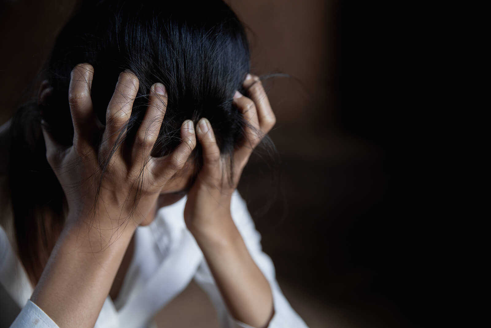 upset woman | anxiety therapist in tigard, or | anxiety treatment in tigard, or | anxiety counselor tigard | 97223 | 97224 | 97281 A close up of an upset woman with her hands against her head. This could represent coping with anxiety with an anxiety counselor Tigard. Search for counseling for anxiety Tigard, OR to learn more about how anxiety therapy in Tigard, OR can help today.
