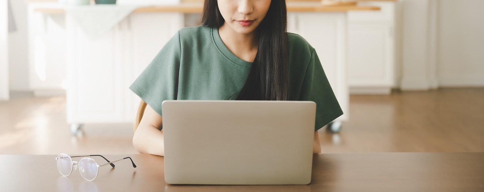 A woman smiles while sitting in front of a laptop. Learn more about making the most of online therapy in Oregon. Contact an online therapist in Oregon or search for online therapy Oregon for additional support.
